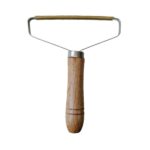Wooden handle lint remover