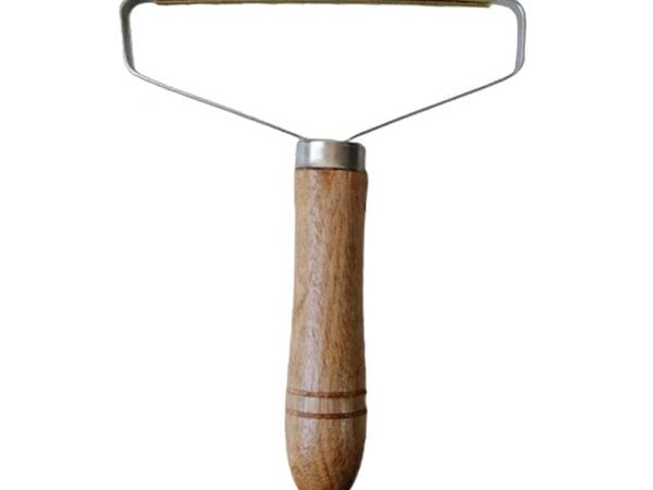 Wooden handle lint remover